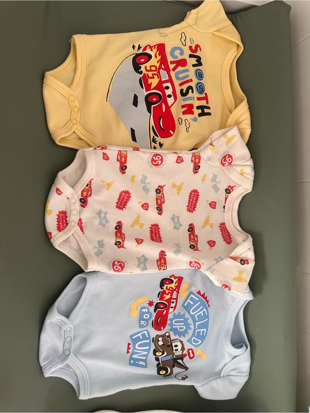 Disney 3-Pack Baby Bodysuits in Yellow, Cream, Light Blue with Cars